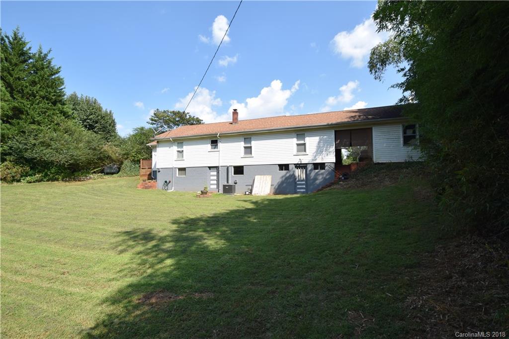 121 Thompson Road Rutherfordton, NC 28139 - Photo 25 of 29 a view of a house with a yard porch and sitting area