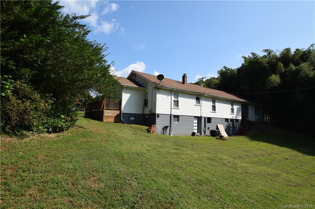 121 Thompson Road Rutherfordton, NC 28139 - Photo 27 of 29 a view of a house with a yard and sitting area