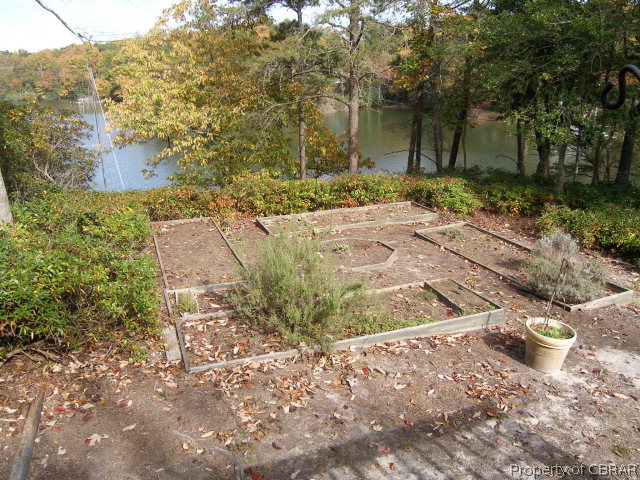 879 West Point Road Lancaster, VA 22503 - Photo 26 of 38 a view of a yard with plants and trees