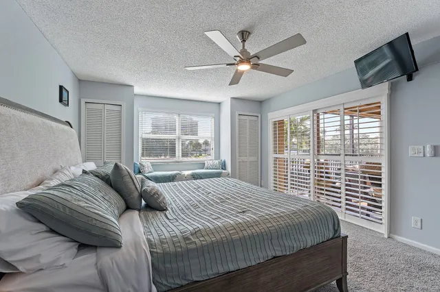 a spacious bathroom with a bathtub and shower