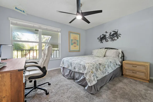 a bathroom with a granite countertop sink a large mirror and vanity