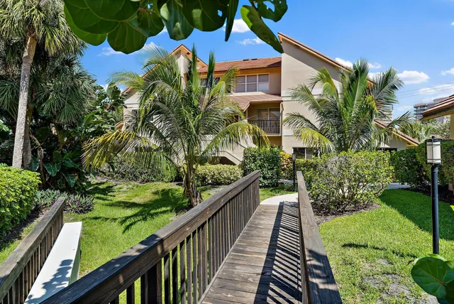 a view of balcony with a potted plant