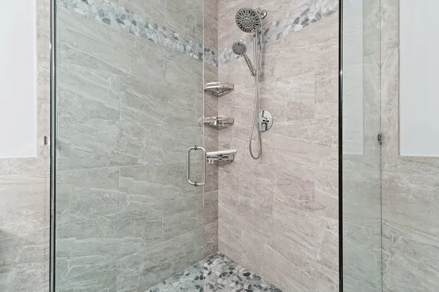 a swimming pool is in the middle of a big yard