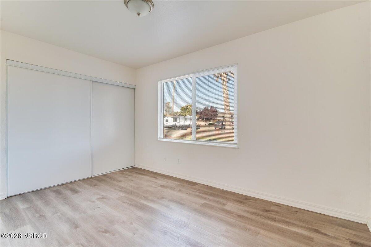 321 North Z Street Lompoc, CA 93436 - Photo 21 of 33 a view of an empty room with closet and a window