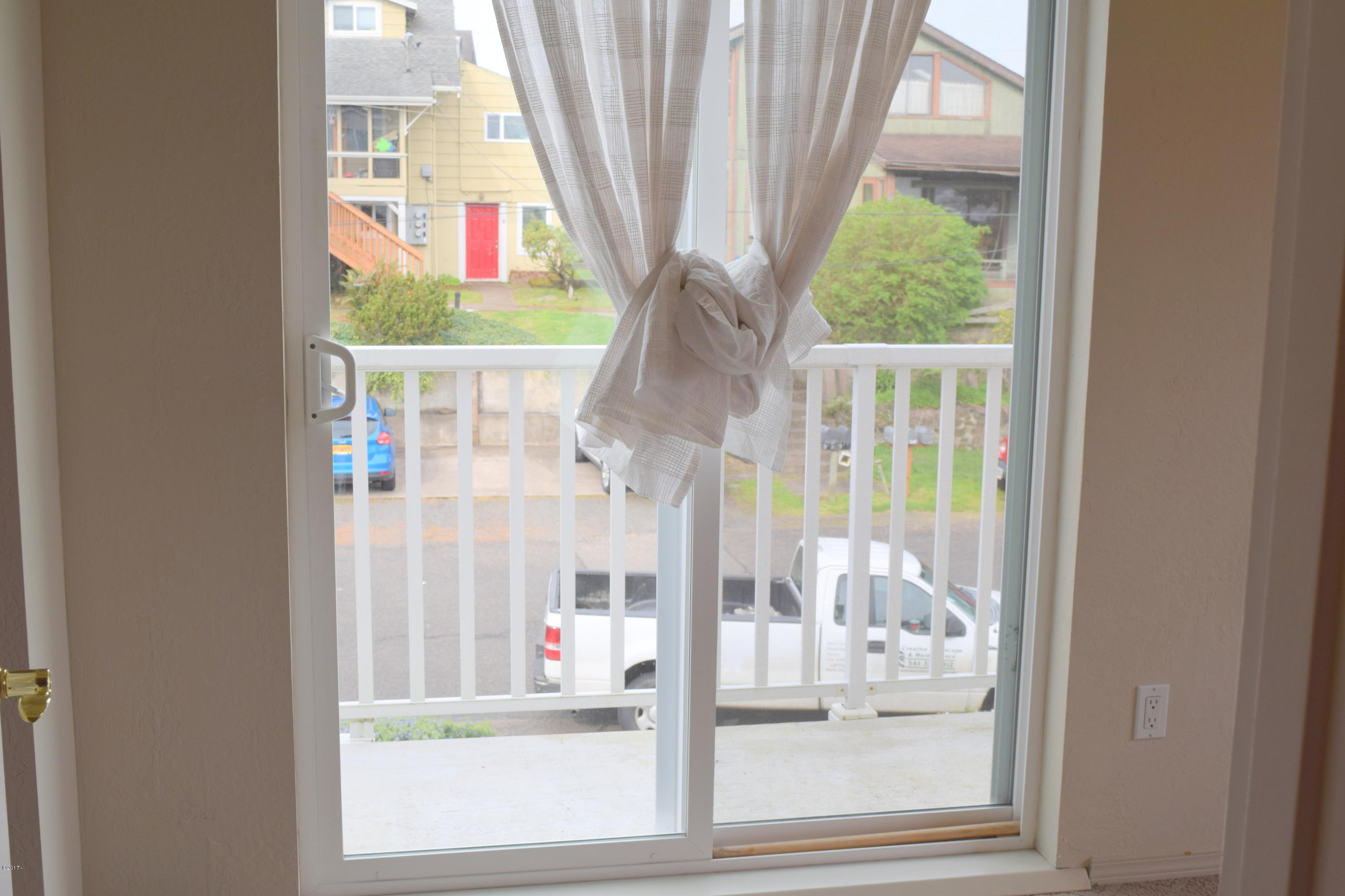 911 Southwest 12th Street Newport, OR 97365 - Photo 22 of 29 Bedroom 1 Porch