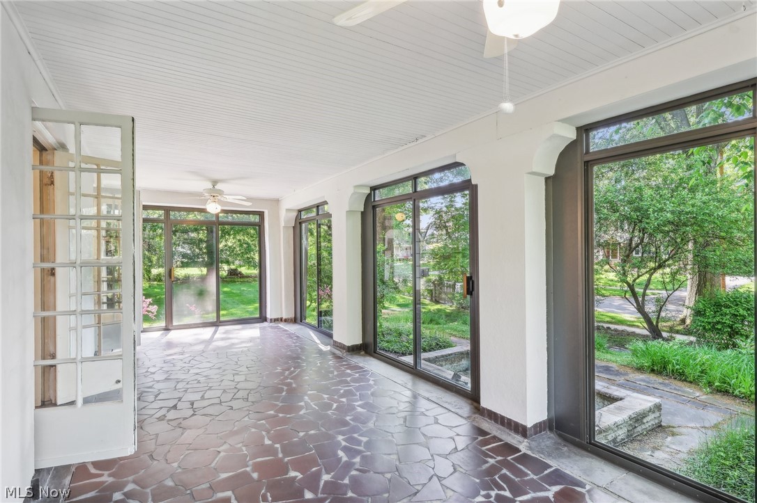 2329 Stillman Road Cleveland, OH 44118 - Photo 20 of 49 Unfurnished sunroom with plenty of natural light and ceiling fan