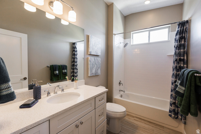 252 East Sandy Sage Way Sandy, UT 84070 - Photo 25 of 36 Bathroom featuring a single vanity with an integrated sink, polished chrome faucet, and recessed lighting
