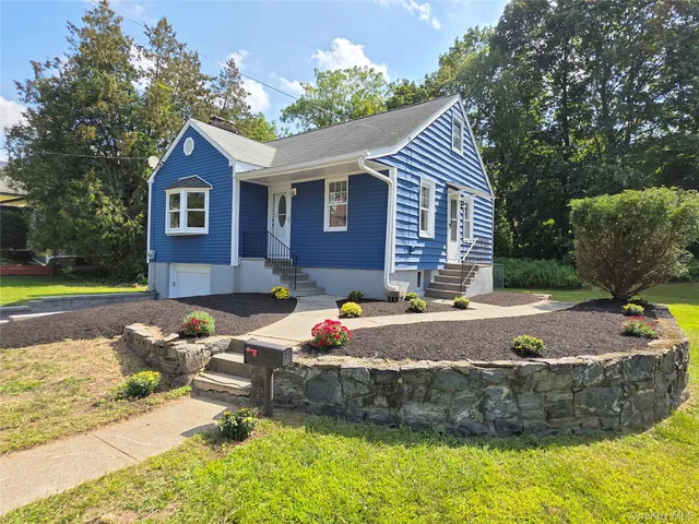 a view of house with outdoor space