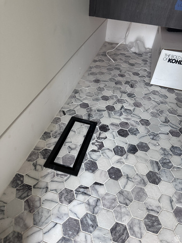 1918 Chimney Rock Road Heber City, UT 84032 - Photo 67 of 74 Hexagonal tile flooring with variegated gray and white tones, featuring a black linear floor register