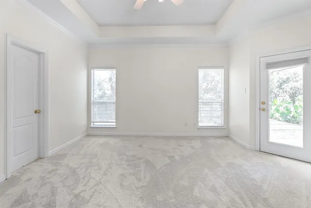 an empty room with windows