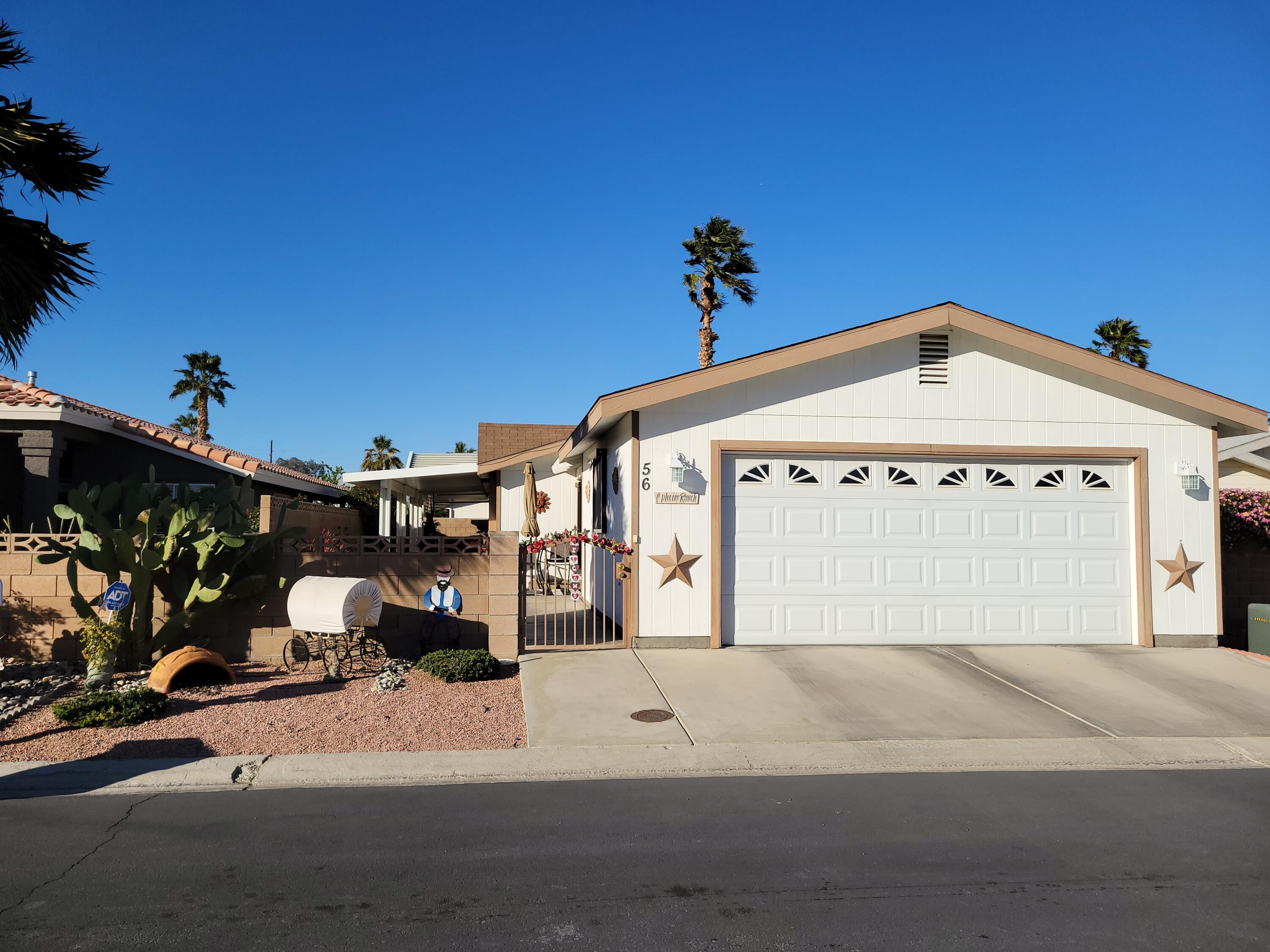 81641 Ave 48, Unit 56 Indio, CA 92201 - Photo 1 of 28 a front view of a building