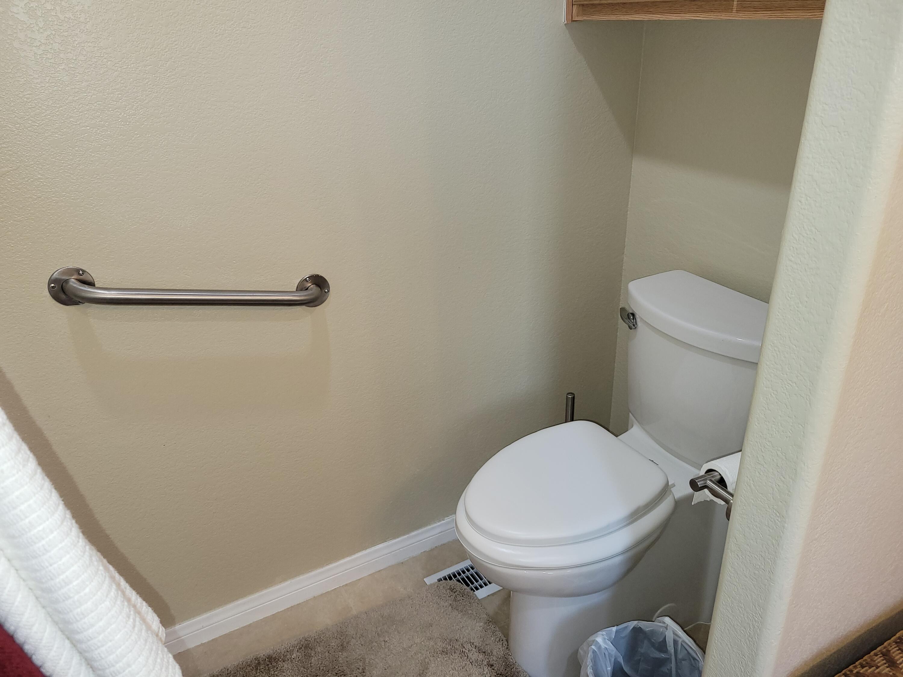 81641 Ave 48, Unit 56 Indio, CA 92201 - Photo 14 of 28 a white toilet sitting next to a shower