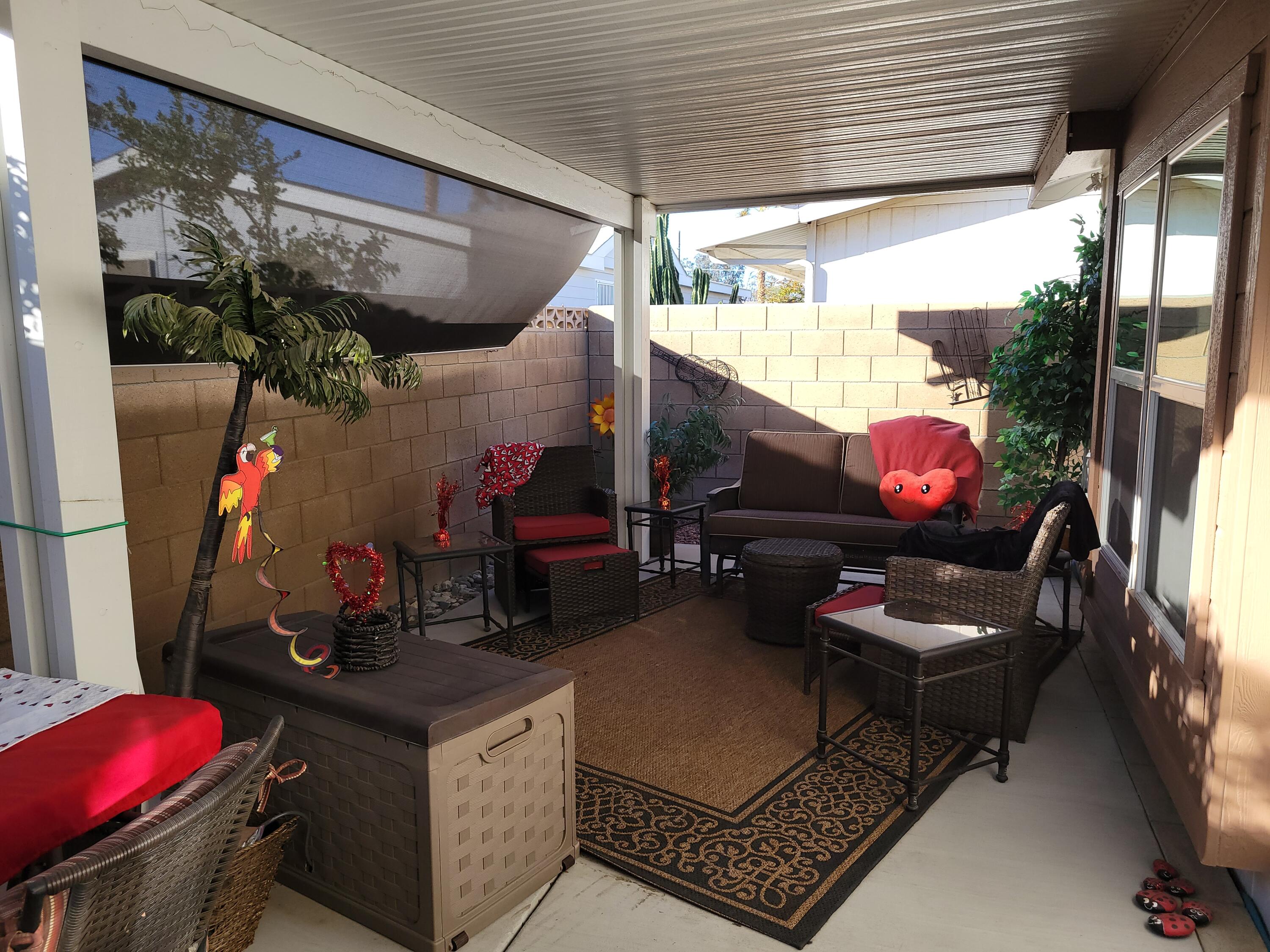 81641 Ave 48, Unit 56 Indio, CA 92201 - Photo 19 of 28 a outdoor living space with furniture