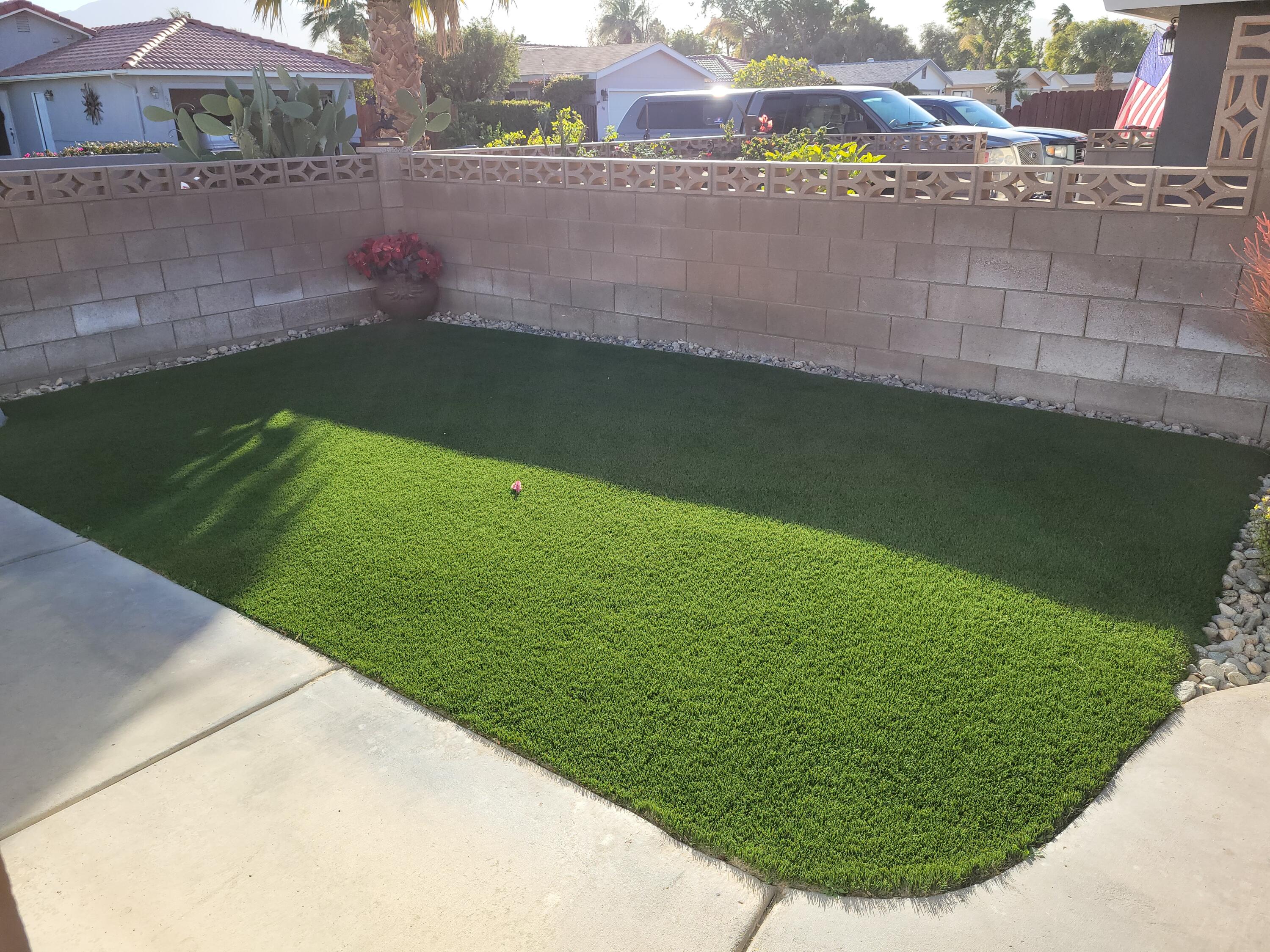81641 Ave 48, Unit 56 Indio, CA 92201 - Photo 21 of 28 a view of a back yard of a house