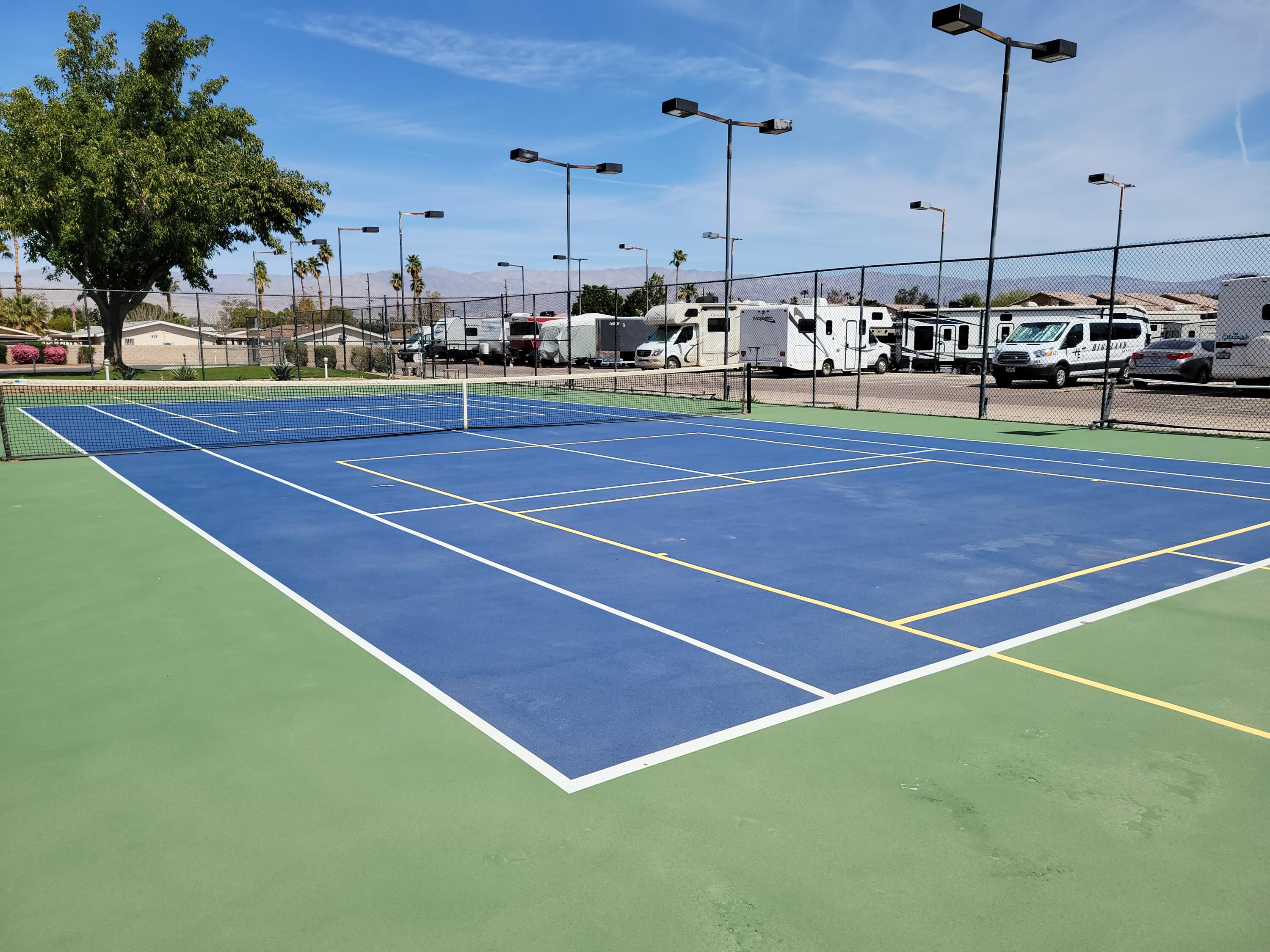 81641 Ave 48, Unit 56 Indio, CA 92201 - Photo 23 of 28 a view of a tennis court