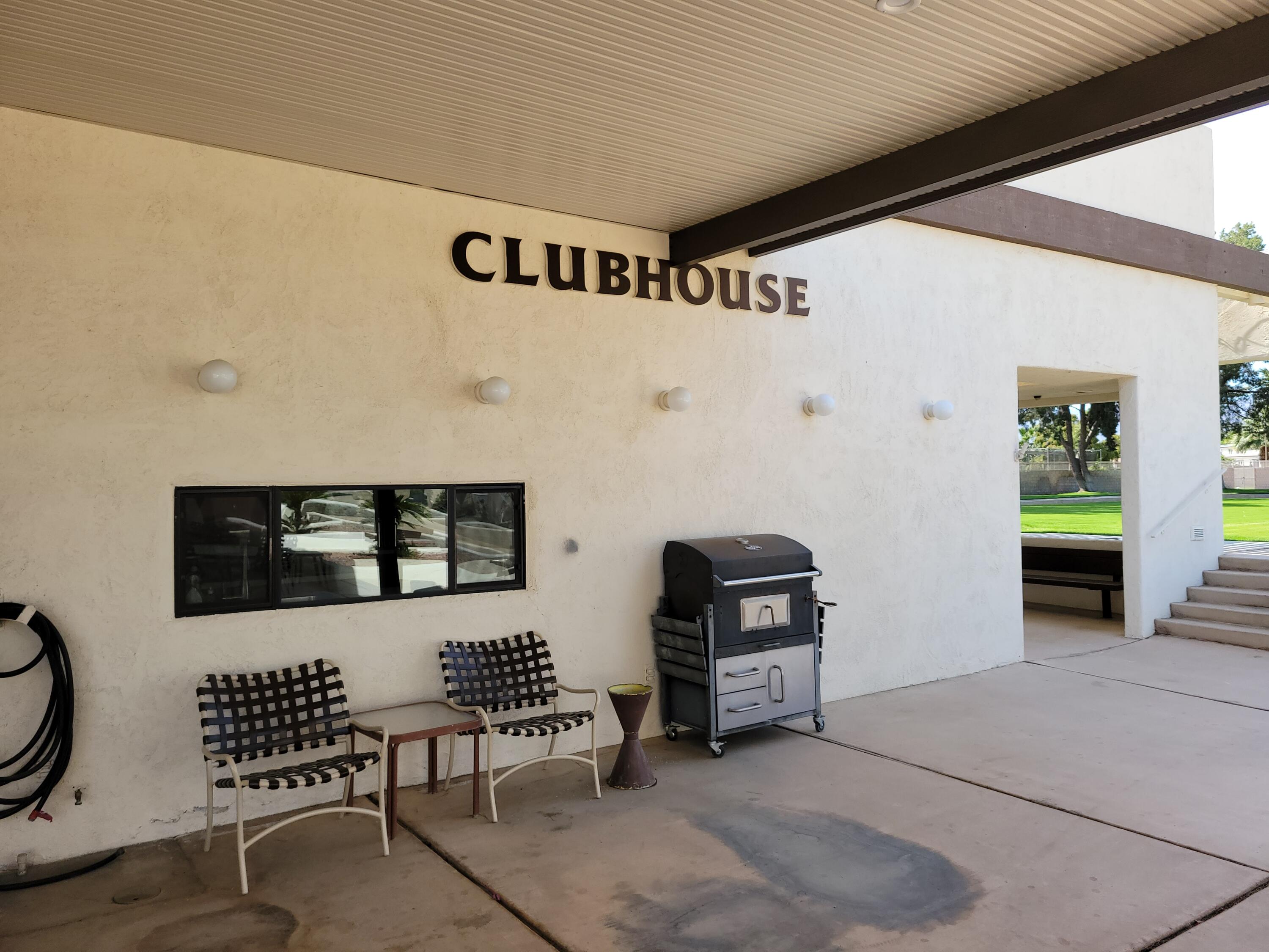 81641 Ave 48, Unit 56 Indio, CA 92201 - Photo 24 of 28 a bedroom with furniture and a window