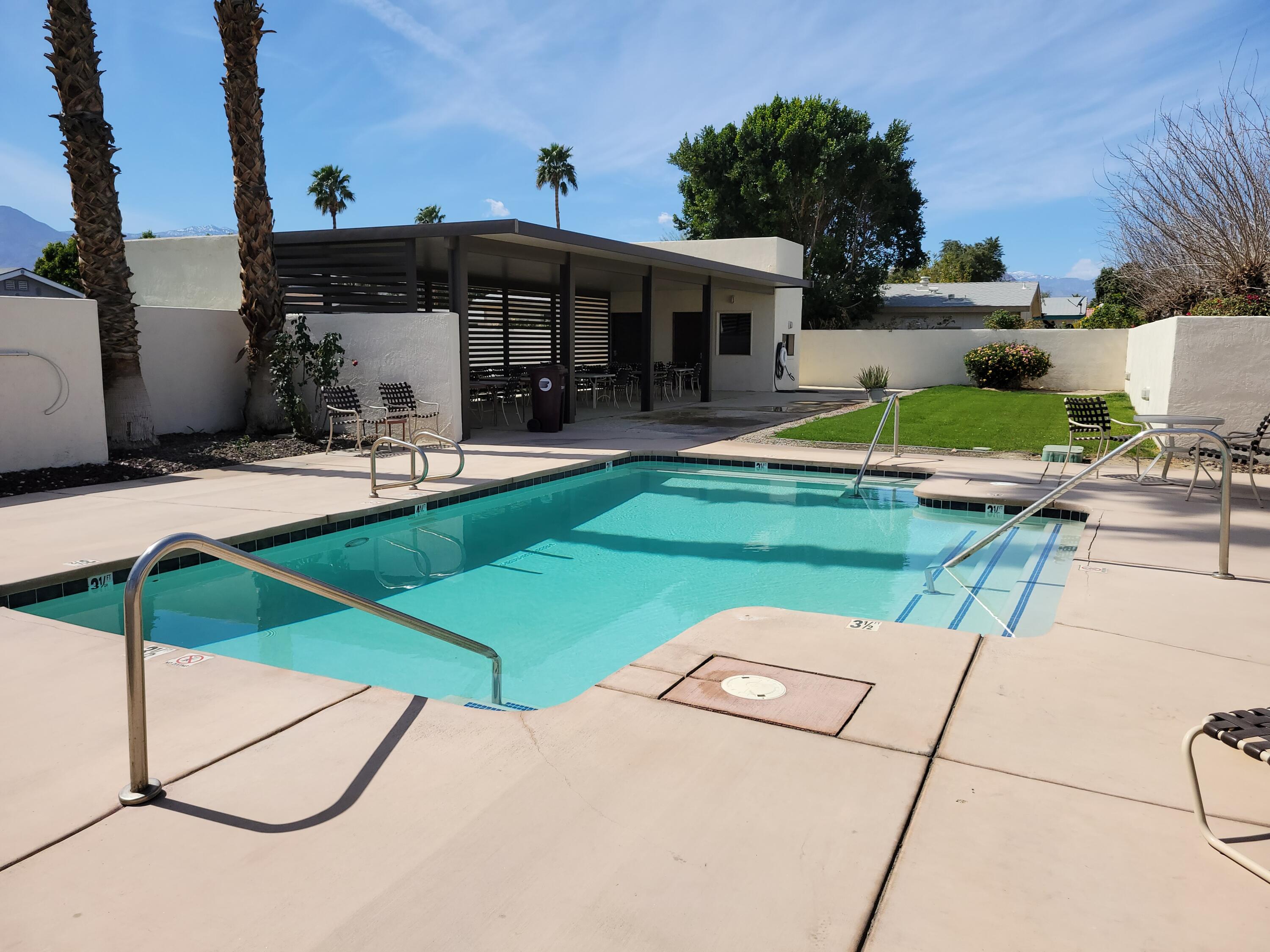 81641 Ave 48, Unit 56 Indio, CA 92201 - Photo 27 of 28 a view of a house with swimming pool