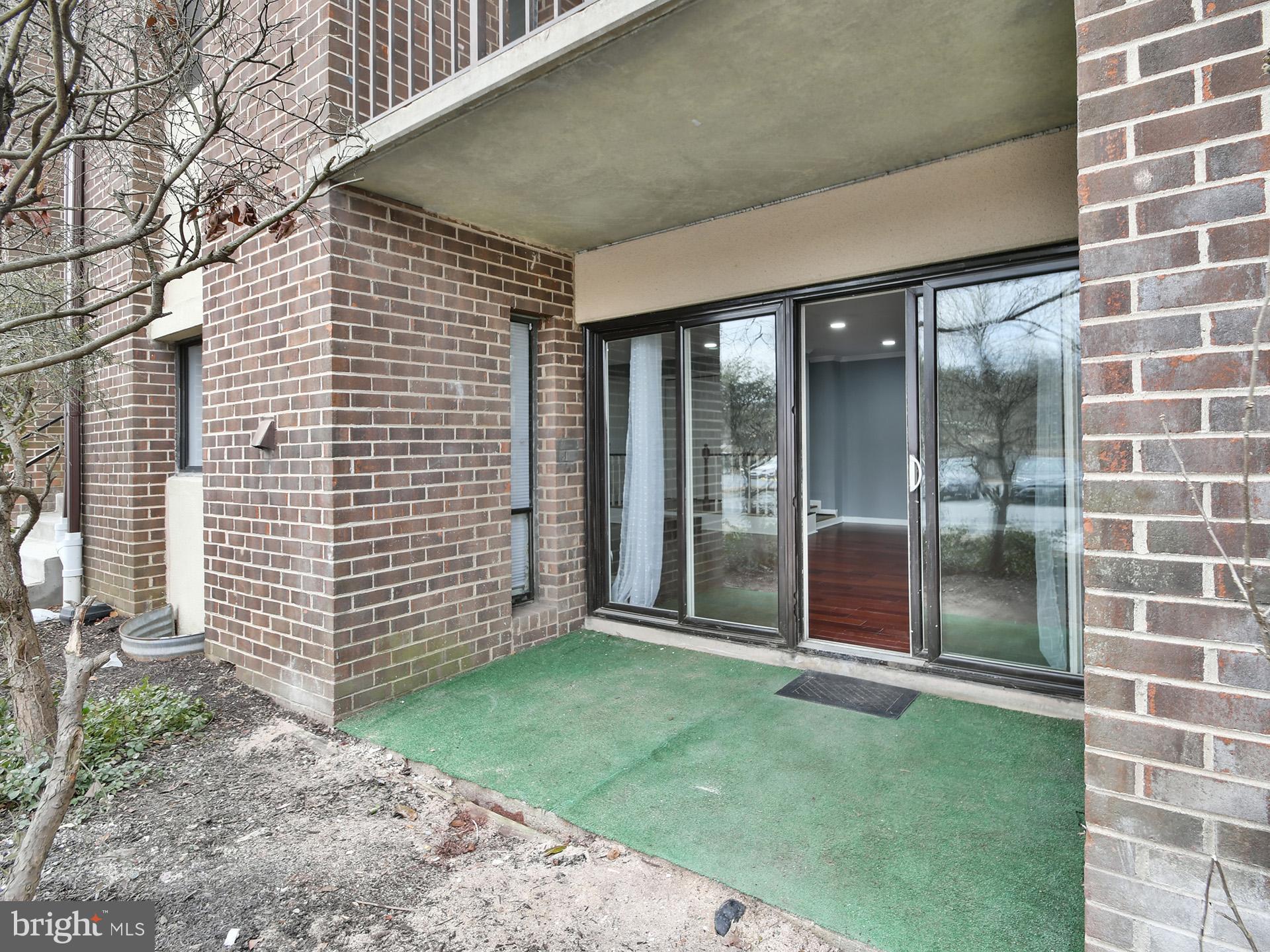 15712 Dorset Road, Unit 104 Laurel, MD 20707 - Photo 40 of 49 a view of outdoor space with garden