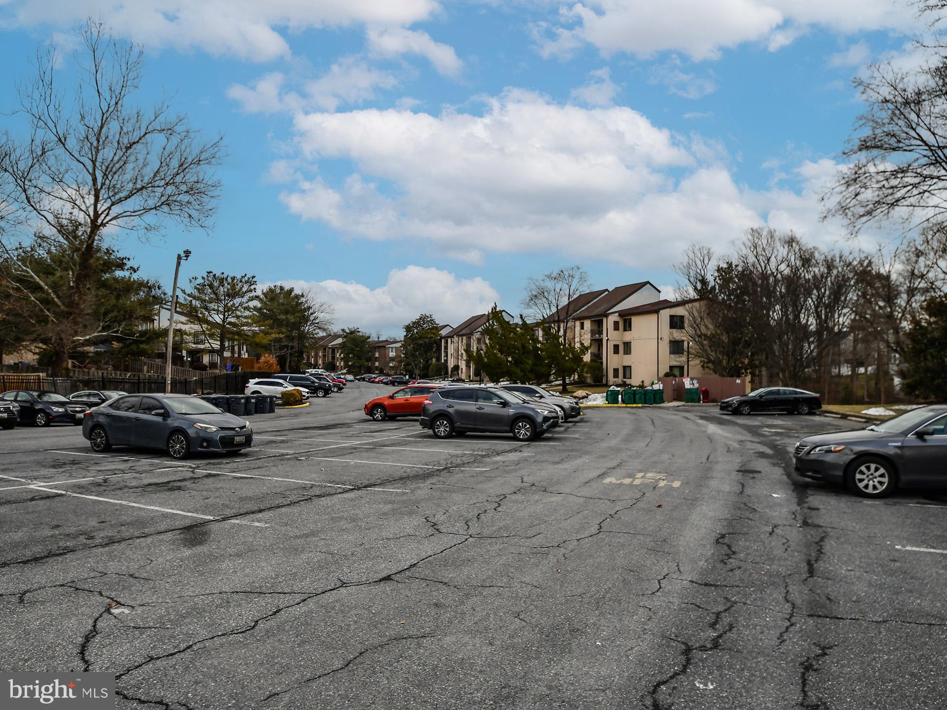 15712 Dorset Road, Unit 104 Laurel, MD 20707 - Photo 47 of 49 a view of street with parked cars