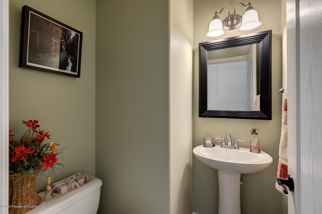 3683 Giddings Ranch Road Altadena, CA 91001 - Photo 14 of 30 a bathroom with a sink and a mirror