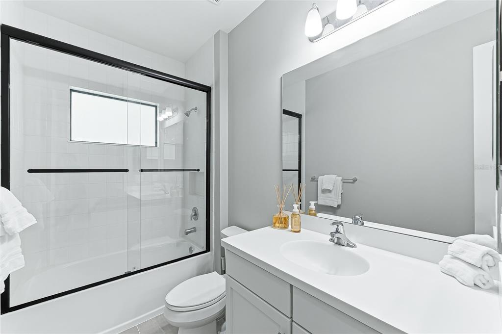 4191 Pegasus Way Naples, FL 34120 - Photo 25 of 48 a bathroom with a sink toilet tub and shower