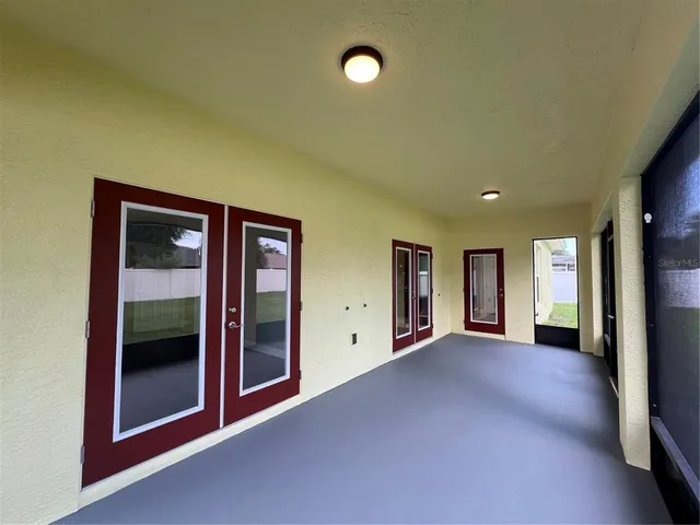 an empty room with windows