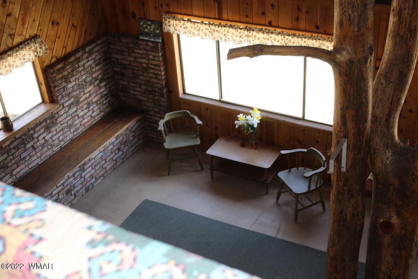 522 Forest Service 412 Road Overgaard, AZ 85933 - Photo 13 of 15 a living room with furniture and a window