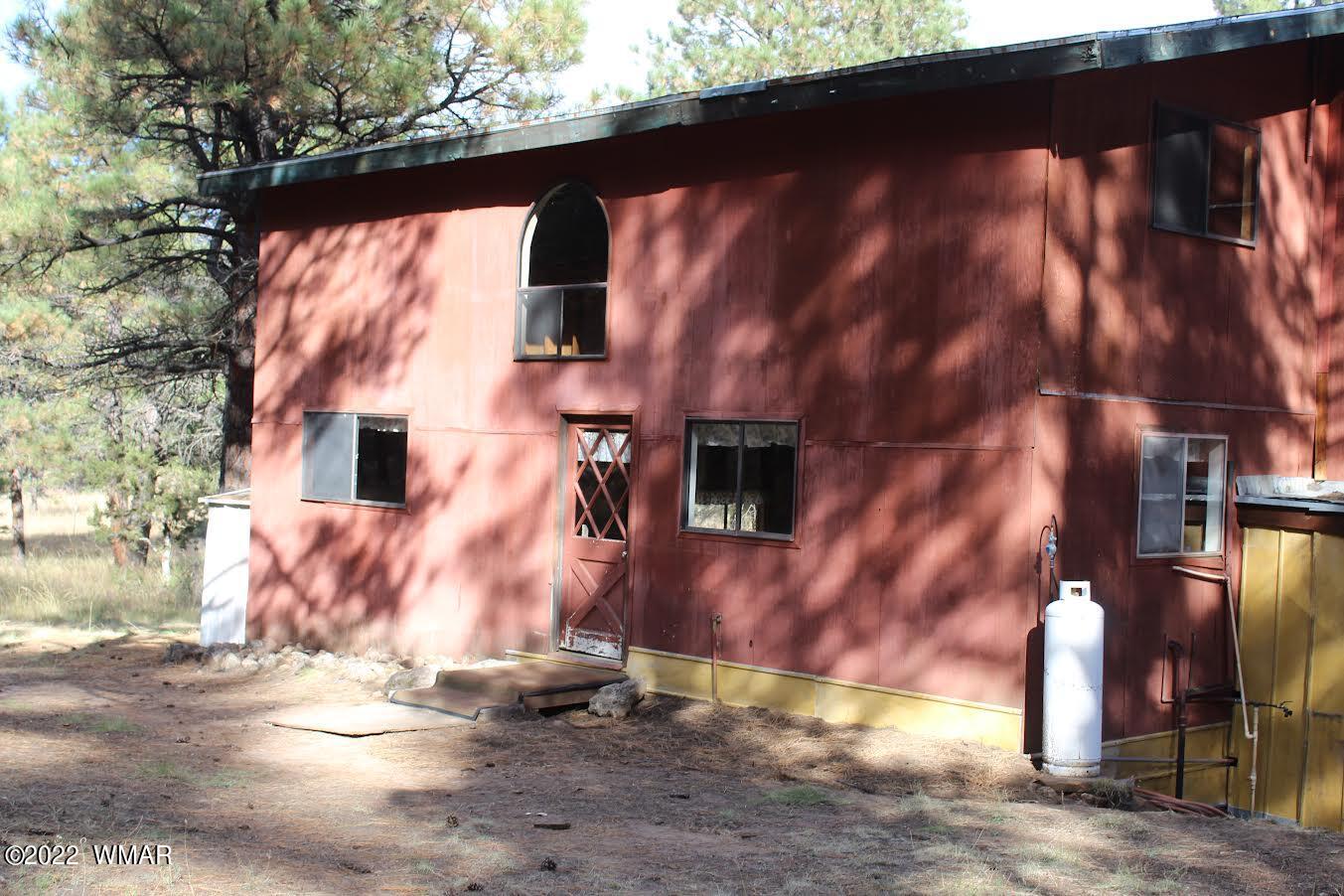 522 Forest Service 412 Road Overgaard, AZ 85933 - Photo 2 of 15 a view of a back yard of the house