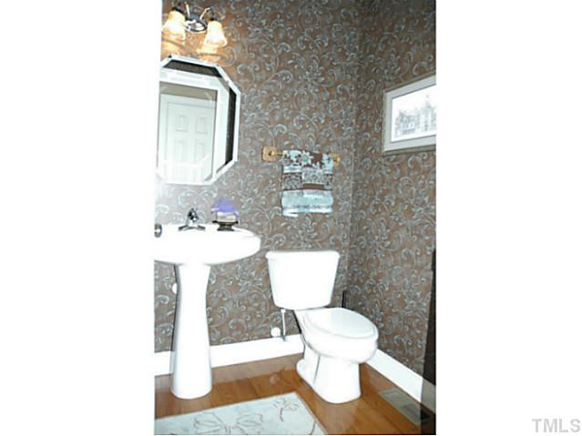 2305 St Paul's Square Raleigh, NC 27614 - Photo 11 of 25 Off of the downstairs office is a 1/2 bath. Half Bath
