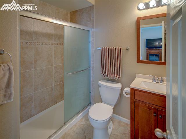 829 Spectrum Loop Colorado Springs, CO 80921 - Photo 17 of 19 Basement 3/4 bath with large shower.