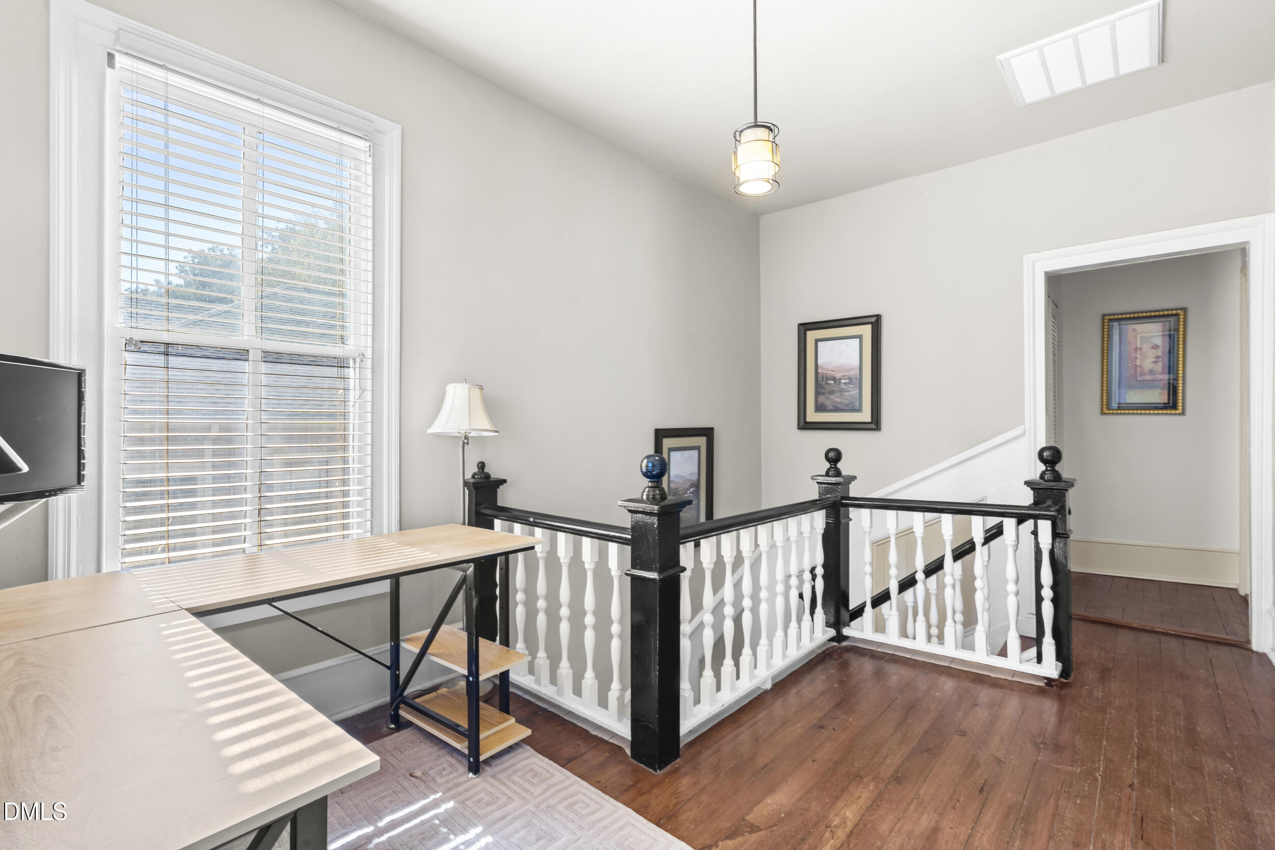 527 North East Street Raleigh, NC 27604 - Photo 24 of 46 a view of a room with wooden floor and windows