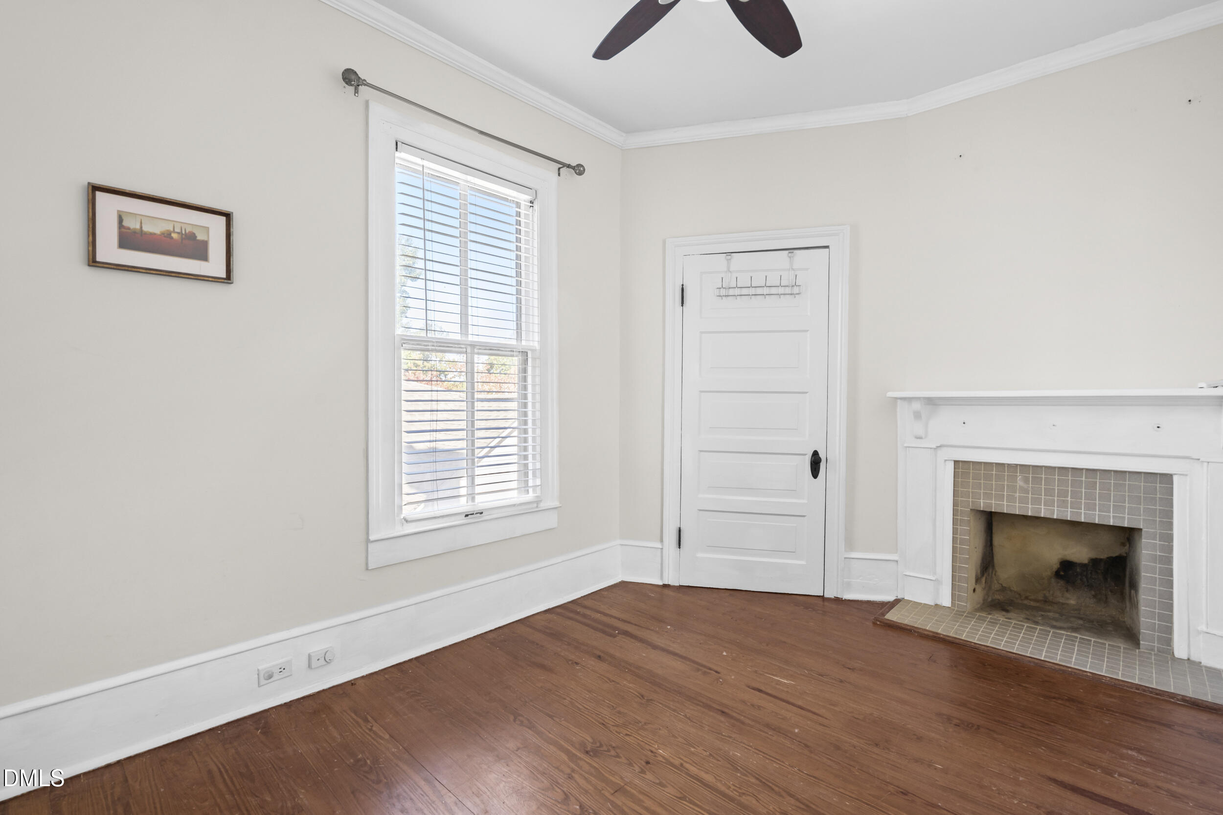 527 North East Street Raleigh, NC 27604 - Photo 27 of 46 an empty room with wooden floor cabinet and windows