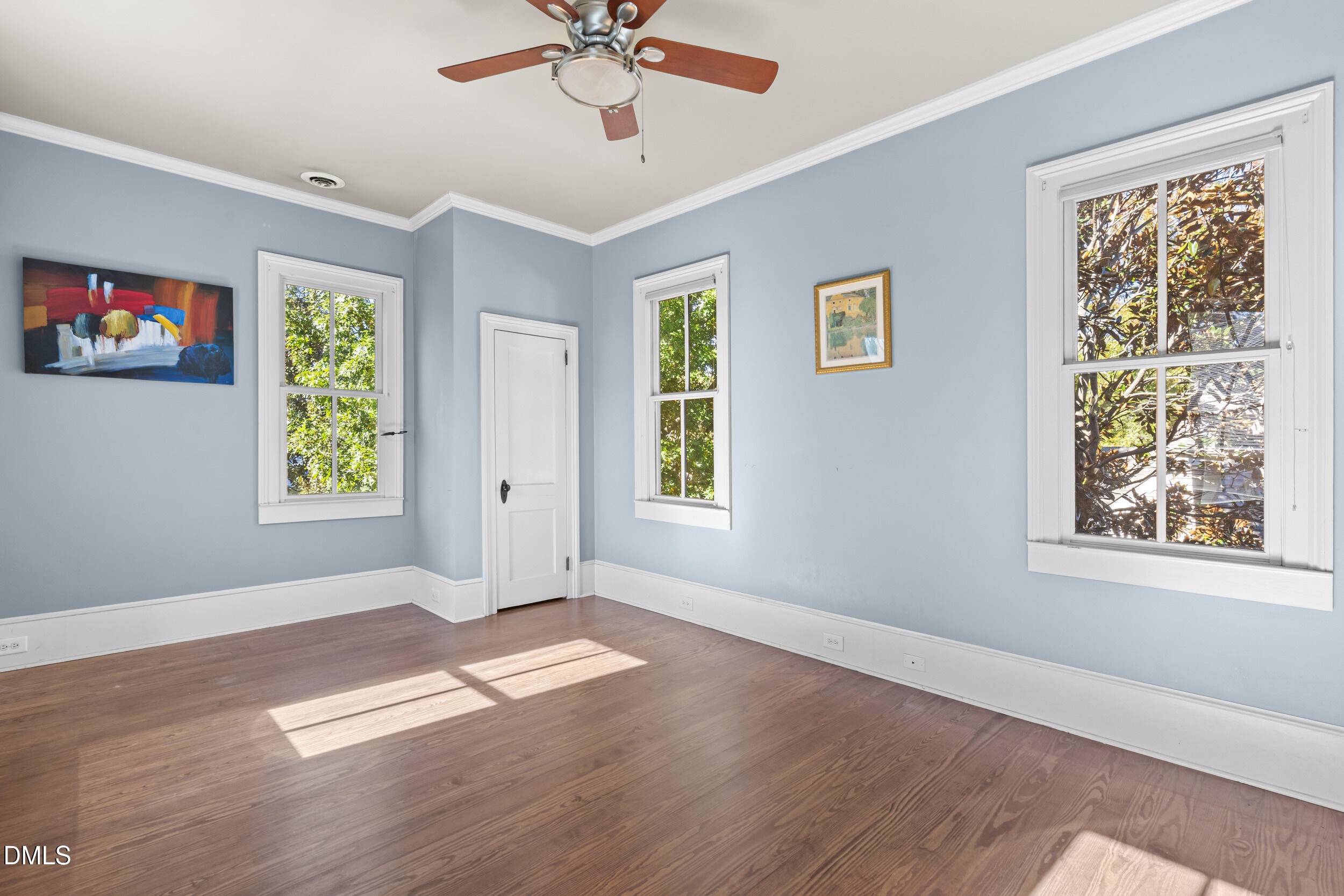 527 North East Street Raleigh, NC 27604 - Photo 28 of 46 a view of an empty room with a window and wooden floor