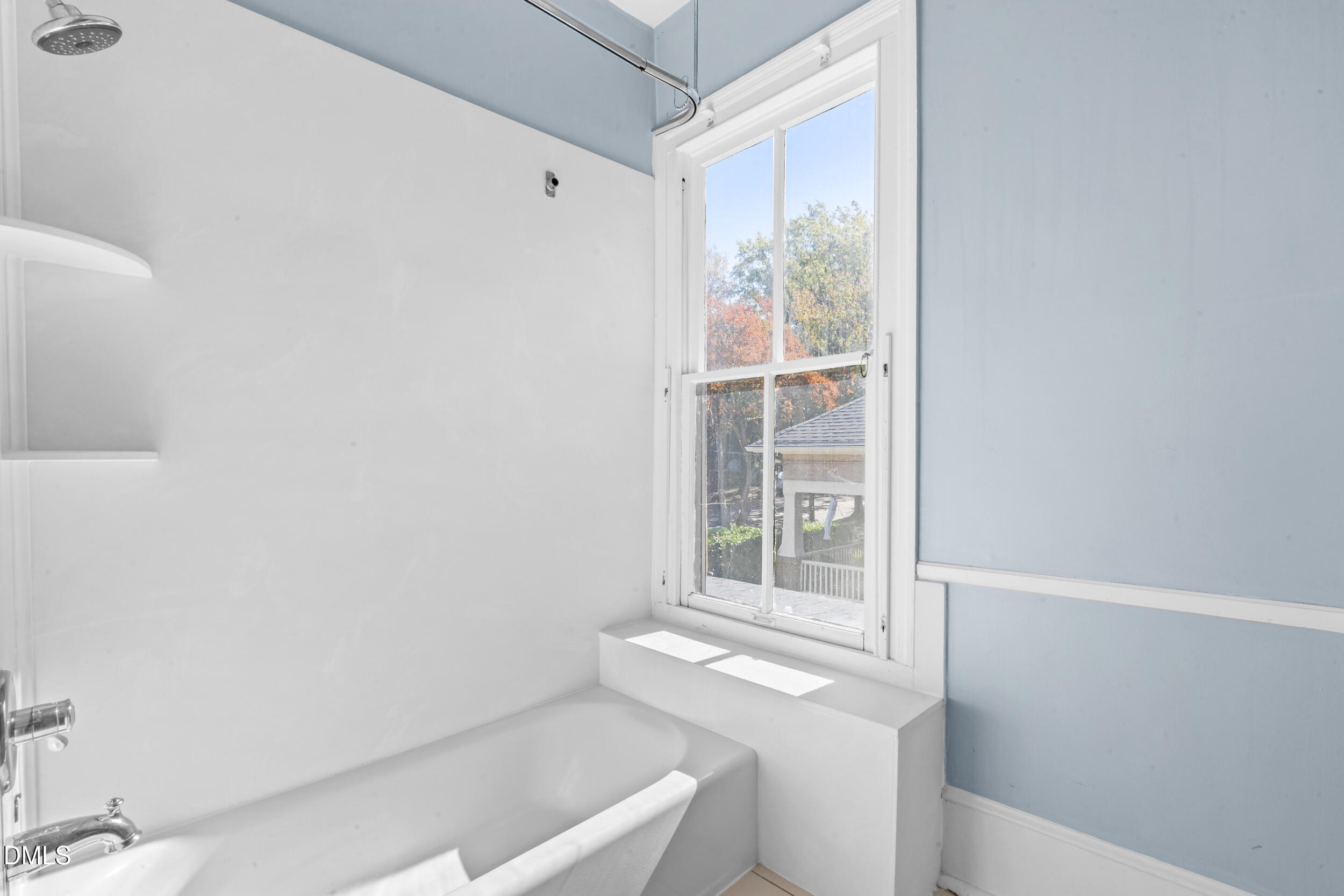 527 North East Street Raleigh, NC 27604 - Photo 31 of 46 a bathroom with a window and a shower