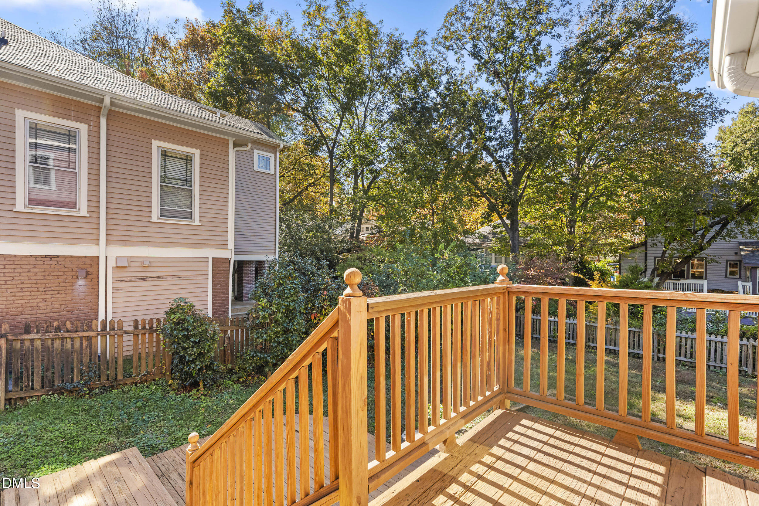 527 North East Street Raleigh, NC 27604 - Photo 32 of 46 a view of a wooden deck and a yard with wooden fence