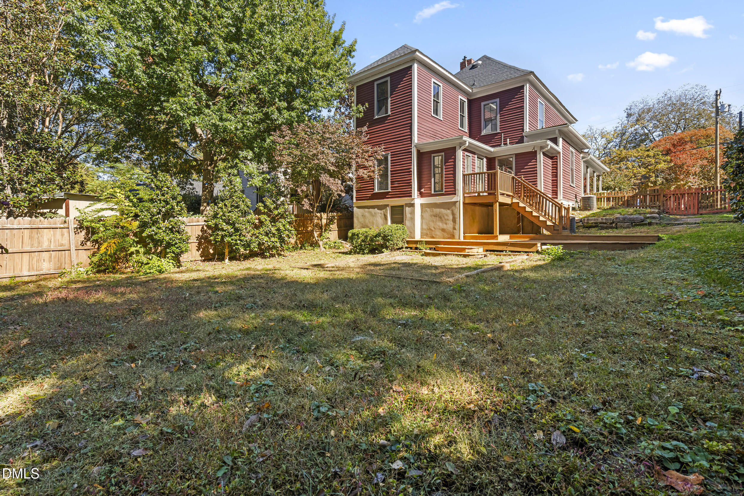 527 North East Street Raleigh, NC 27604 - Photo 35 of 46 a view of a large house with a big yard and large trees