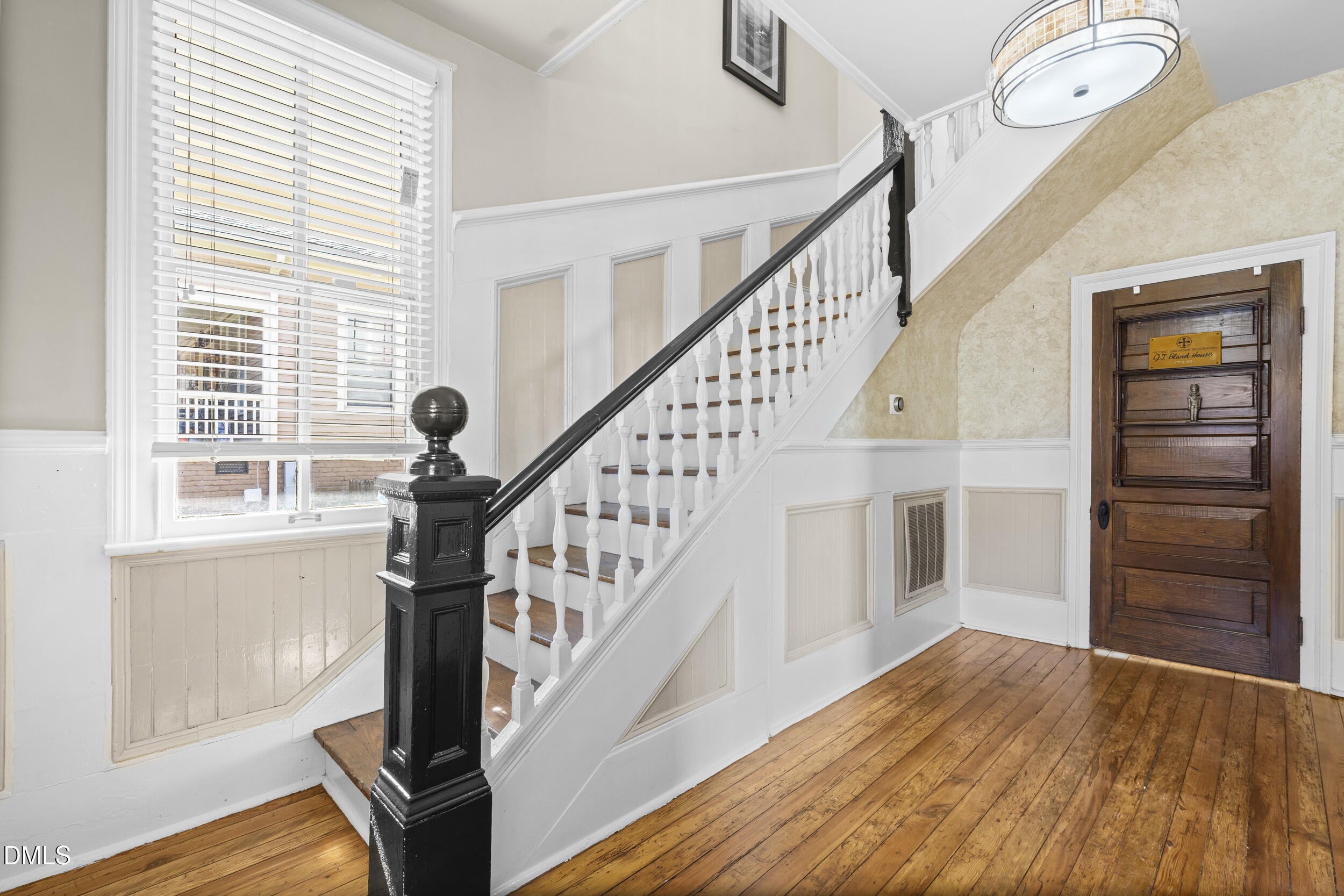 527 North East Street Raleigh, NC 27604 - Photo 6 of 46 a view of entryway and hall with wooden floor