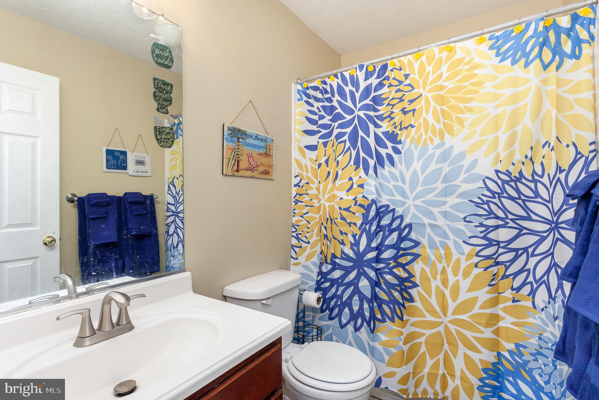 828 Lowe Road Middle River, MD 21220 - Photo 24 of 29 Upper Level 2 Hall Bathroom with Tub/Shower Combo