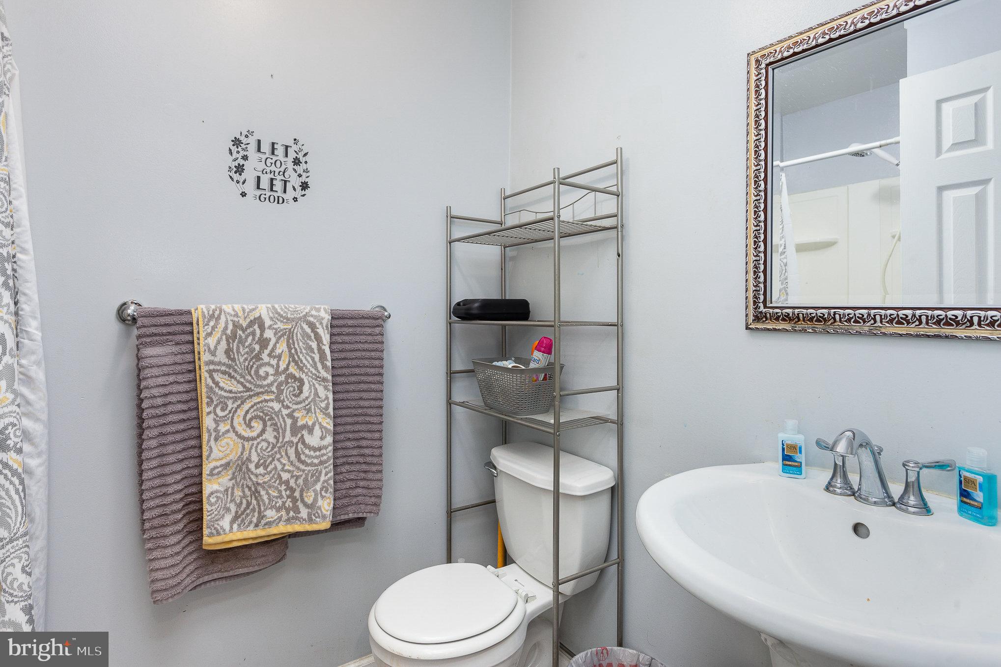 828 Lowe Road Middle River, MD 21220 - Photo 6 of 29 Main Level Bathroom 1 with Standing Shower