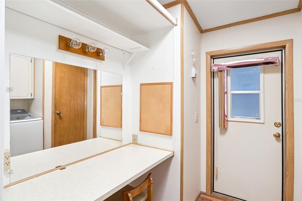 3122 Myakka River Road Tavares, FL 32778 - Photo 20 of 44 a view of a hallway with wooden floor