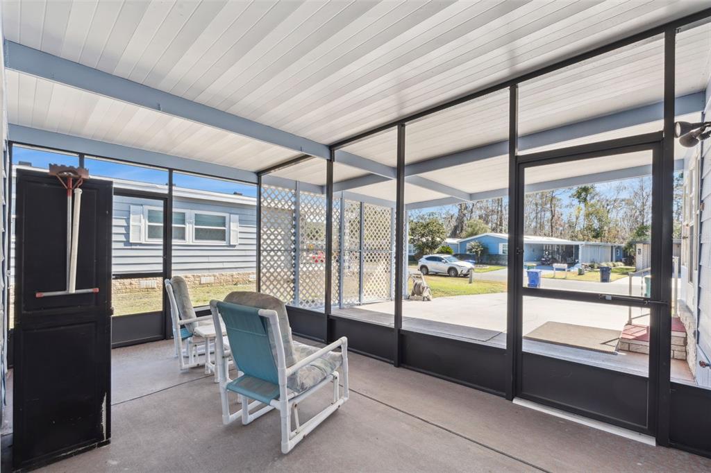 3122 Myakka River Road Tavares, FL 32778 - Photo 31 of 44 a building outdoor space with seating