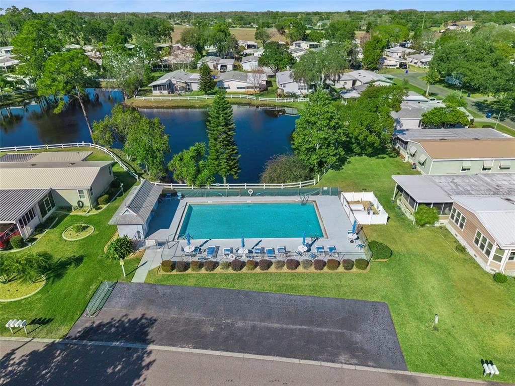 3122 Myakka River Road Tavares, FL 32778 - Photo 42 of 44 an aerial view of a house with a garden