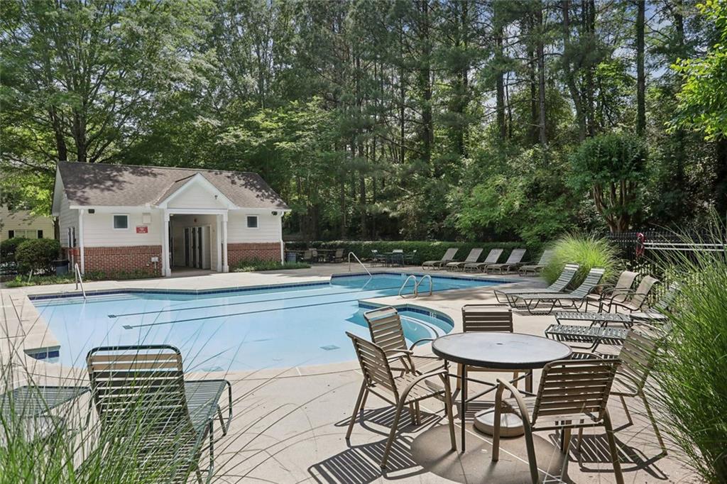 206 Spring Heights Lane, Unit 206 Smyrna, GA 30080 - Photo 29 of 29 a view of house with a outdoor seating area
