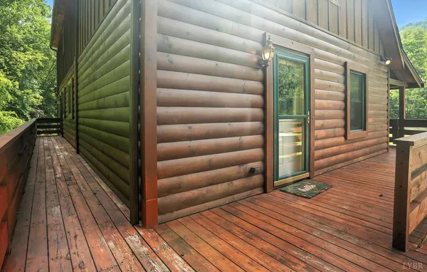 a bathroom with a granite countertop toilet a sink and a mirror
