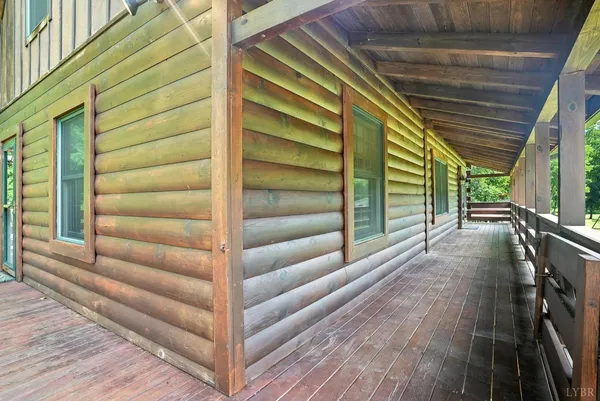 a kitchen with stainless steel appliances granite countertop a sink and a refrigerator