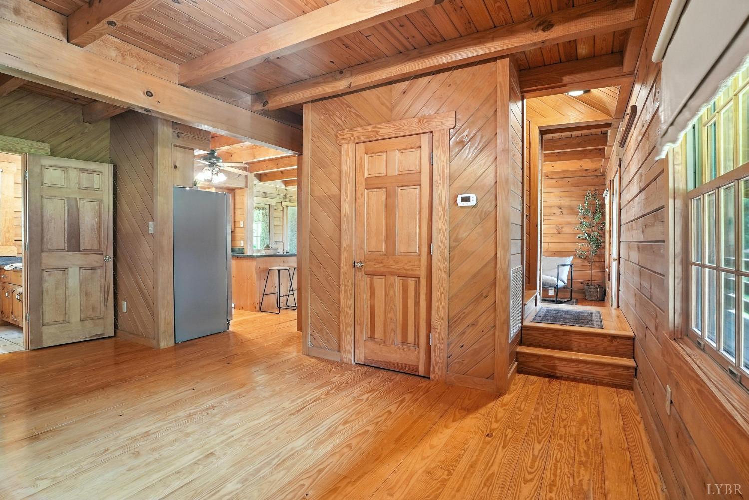 2070 Woodson Road Roseland, VA 22967 - Photo 22 of 76 a view of an entryway with wooden floor and door