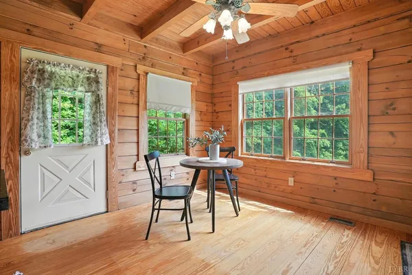 a view of balcony with wooden floor and outdoor space