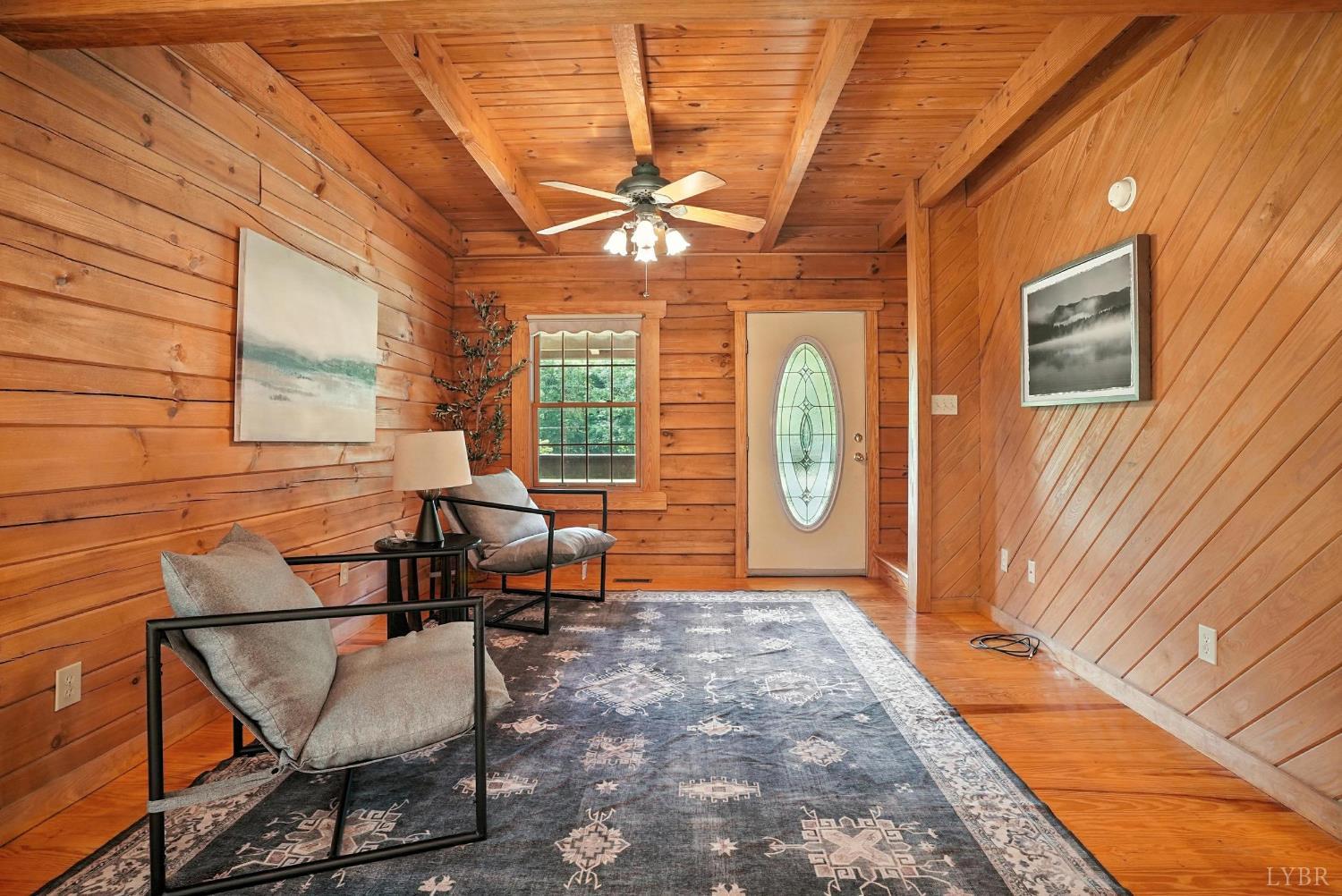 2070 Woodson Road Roseland, VA 22967 - Photo 30 of 76 a view of a patio with a table and chairs