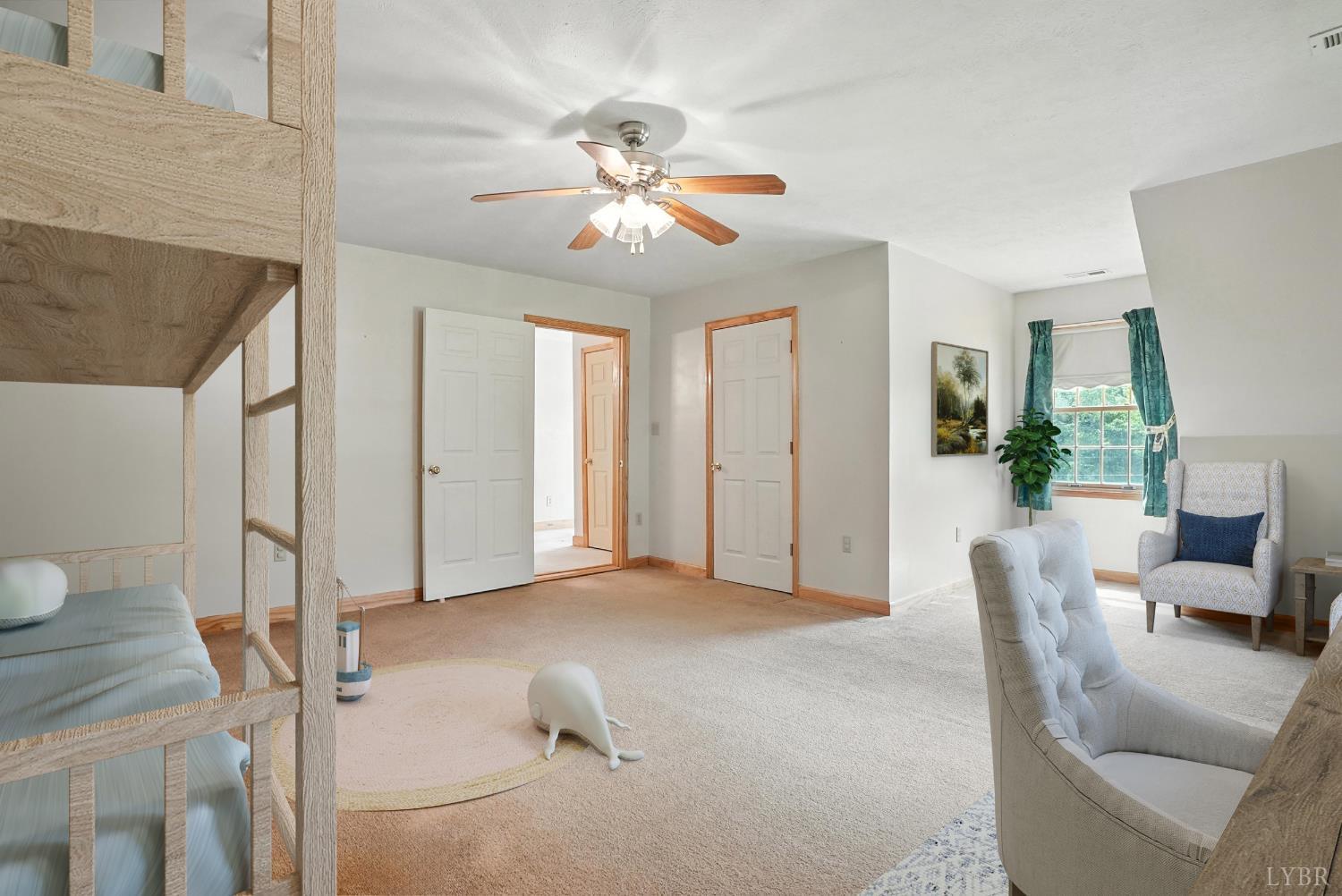 2070 Woodson Road Roseland, VA 22967 - Photo 34 of 76 a view of livingroom with furniture and ceiling fan