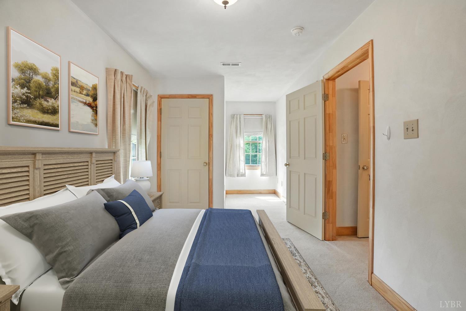 2070 Woodson Road Roseland, VA 22967 - Photo 36 of 76 a living room with furniture and a window